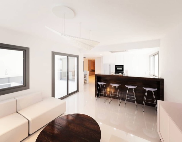 Cocina abierta con isla central — SZB Arquitectura